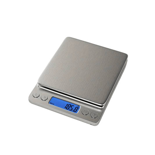 FoodTrip Scale - portabel köksvåg i metall med digital display, perfekt för exakt vägning av matvaror oavsett var du befinner dig.